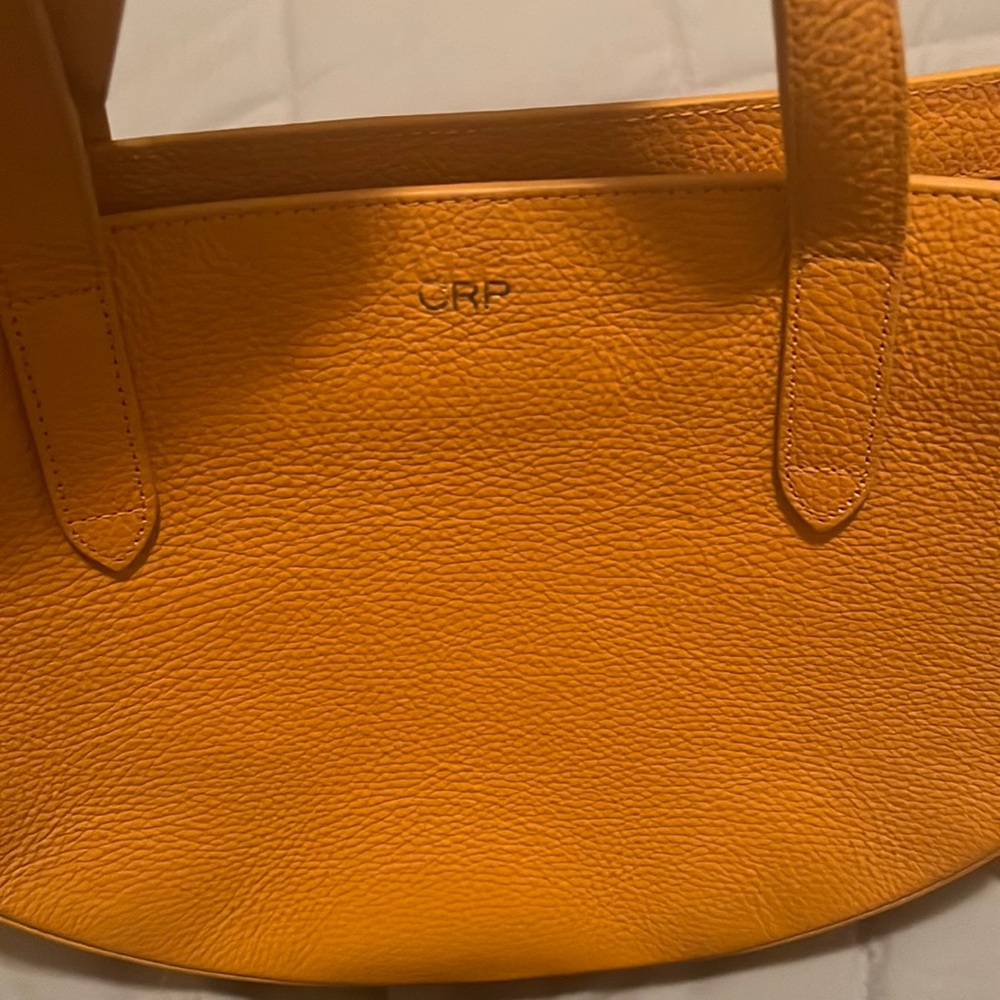 Cuyana cross body bag, but can also be used without the crossover strap.